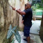 Preparando o muro para uma horta comunitária vertical